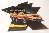 Bedruckte Polystyrolplatte 0,5 mm: Eine orangefarbene Werbeplatte mit einem Opel Mokka, umgeben von schwarzen grafischen Elementen und dem Text „Ready for ordering!“ in Wiesbaden bei City Medien Einkaufswelt für Partner