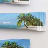 Rohrzuckersticks 3,6 g – bunte Portionssticks 10 x 2 cm mit Strand- und Palmenmotiv, beidseitig bedruckt in Wiesbaden von City Medien Einkaufswelt für Partner günstig kaufen, drucken lassen, online preiswert bestellen – Werbemittel, Eventbedarf, Gastronomiebedarf